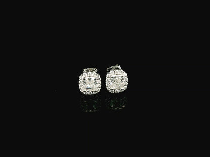 Cushion cut diamond halo stud earrings in 18K white gold with GIA certified diamonds by Emirates Diamonds