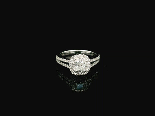 Cushion cut diamond halo ring in 18K white gold with GIA certified center diamond and diamond band – Emirates Diamonds