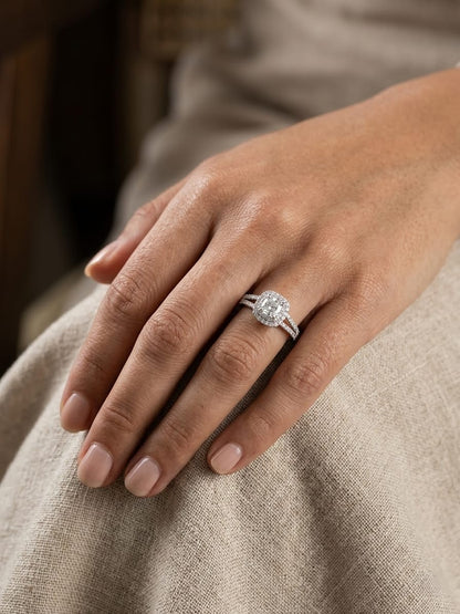 Cushion cut diamond halo ring in 18K white gold with GIA certified center diamond and diamond band – Emirates Diamonds