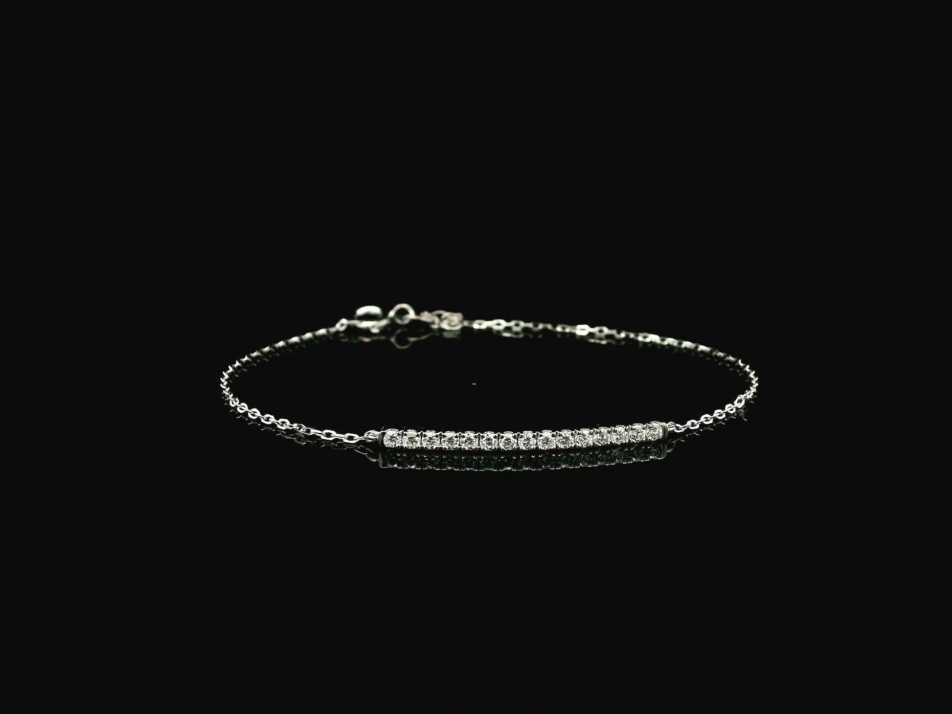 Diamond bar bracelet in 18K white gold featuring 0.38 carat diamonds by Emirates Diamonds.