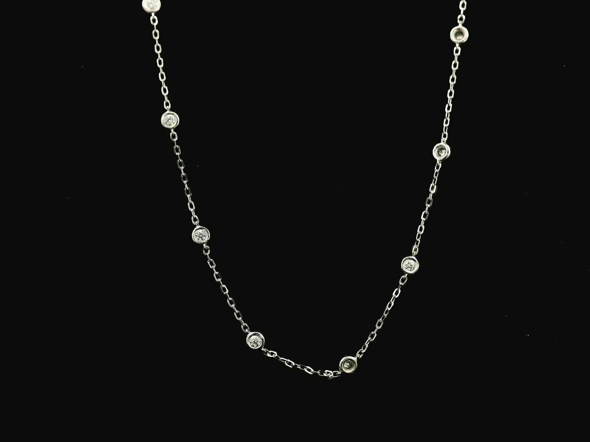 Diamond station necklace in 18K white gold with 0.60ct bezel-set diamonds – Emirates Diamonds