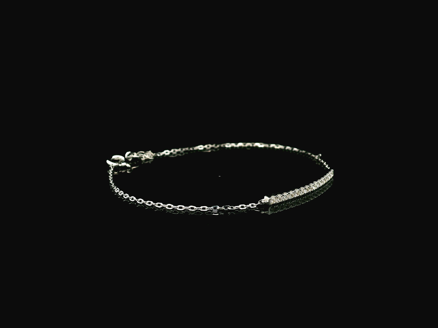 Diamond bar bracelet in 18K white gold featuring 0.38 carat diamonds by Emirates Diamonds.