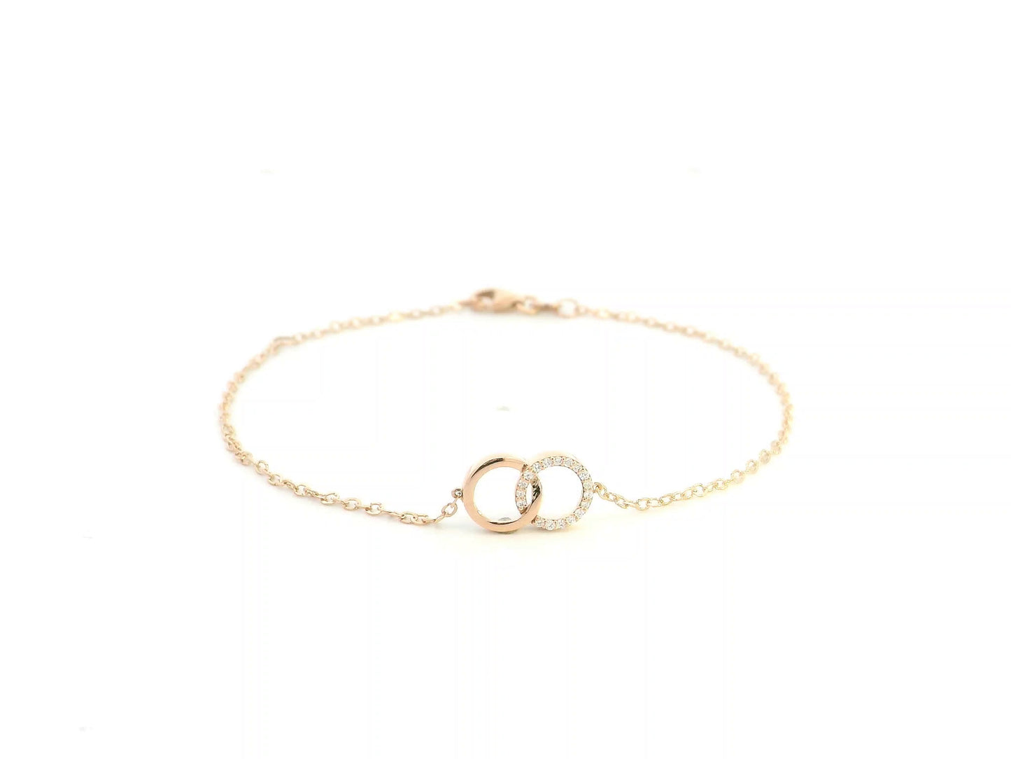 Diamond circle link bracelet in 18K rose gold with pavé diamonds by Emirates Diamonds