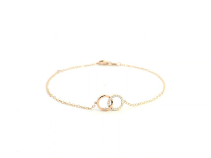Diamond circle link bracelet in 18K rose gold with pavé diamonds by Emirates Diamonds