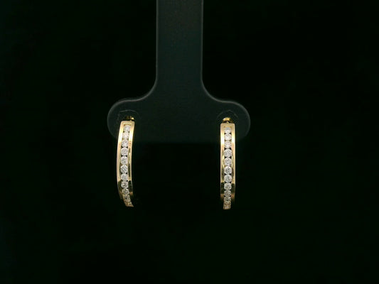 Diamond half hoop earrings with 0.31ct round diamonds set in 18K yellow gold by Emirates Diamonds