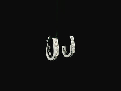 Diamond hoop earrings in 18K white gold featuring 0.98 carats of diamonds by Emirates Diamonds.
