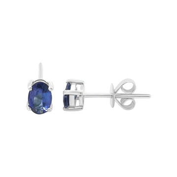 Solitaire Tanzanite Stud Earrings In 18k White Gold.