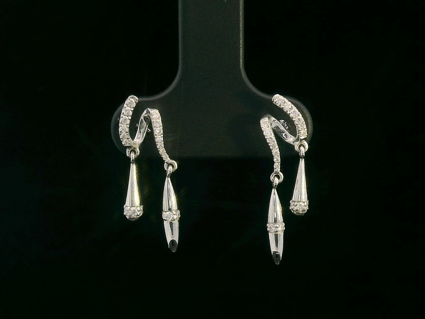 Luxury 18K gold diamond drop earrings with twisting design and dangling accents – 0.16 carat diamonds