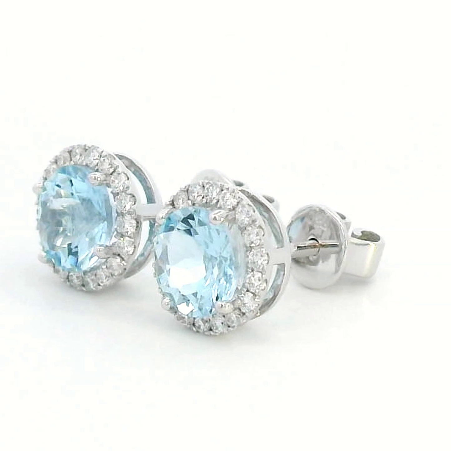 18K Gold Aquamarine & Diamond Halo Earrings .