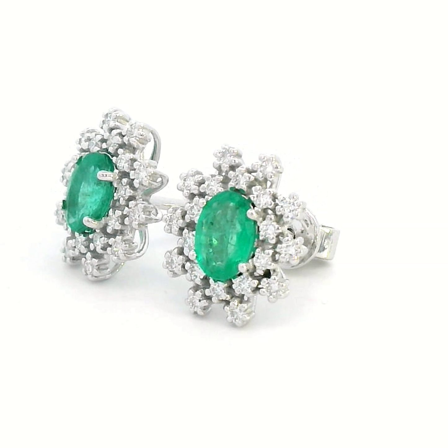 18k White Gold Oval Emerald and Diamond Starburst Stud Earrings.