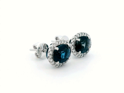 Oval London Blue Topaz & Diamond Halo Stud Earrings In 18k Gold.