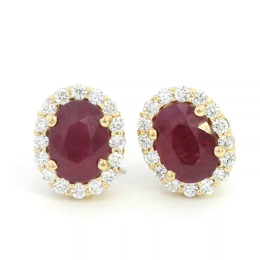 Oval Ruby With  Diamond Halo Earrings In 18k Yellow Gold.