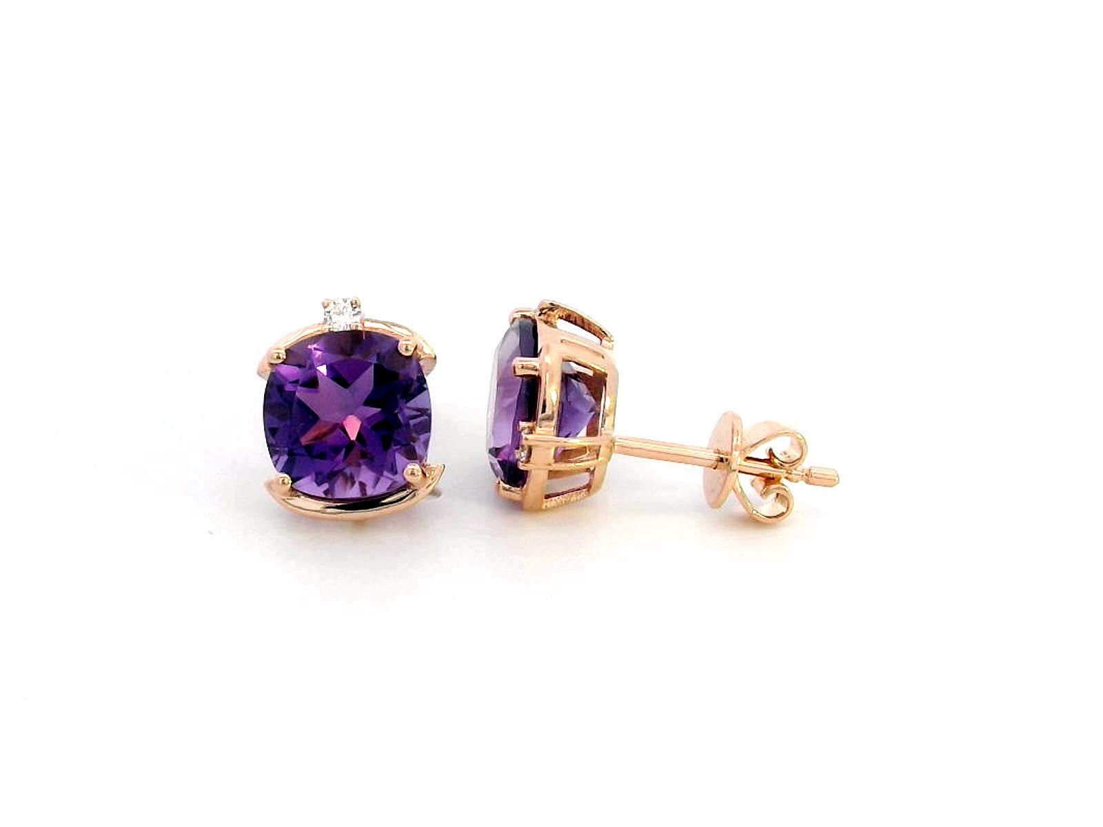 18K gold cushion-cut amethyst stud earrings featuring vibrant 3.99-carat amethysts with diamond accents totaling 0.05 carat.