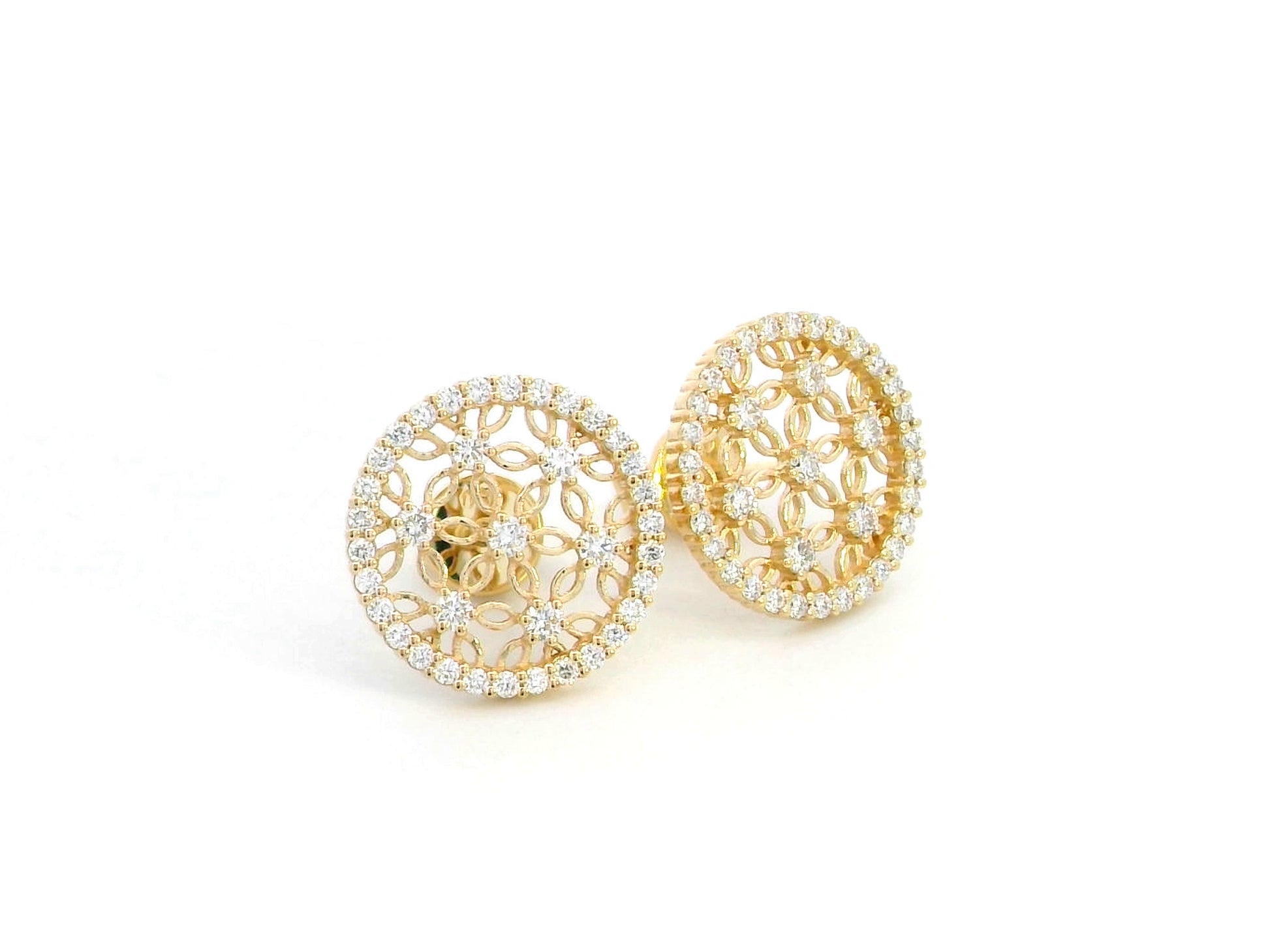 18K yellow gold filigree stud earrings featuring an intricate vintage-inspired openwork floral design, adorned with 0.69 carats of round diamonds and a delicate diamond halo, secured with push-back closures.