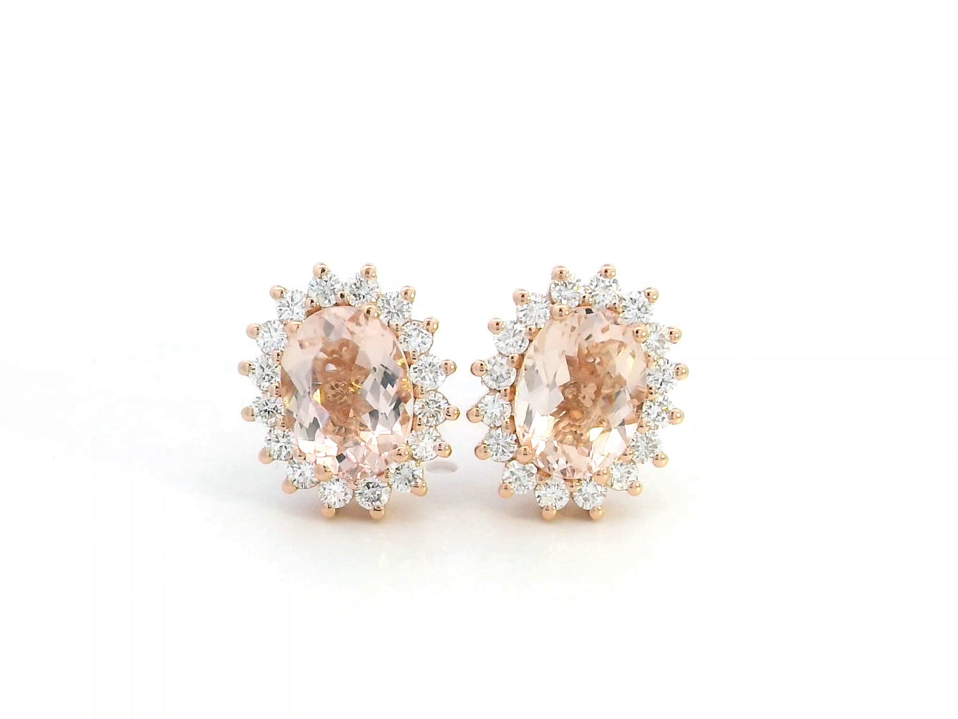 Diana-style 18K rose gold halo stud earrings featuring oval-cut morganites (2.77 carats) and round-cut diamonds (0.56 carats) in a regal, vintage-inspired design.