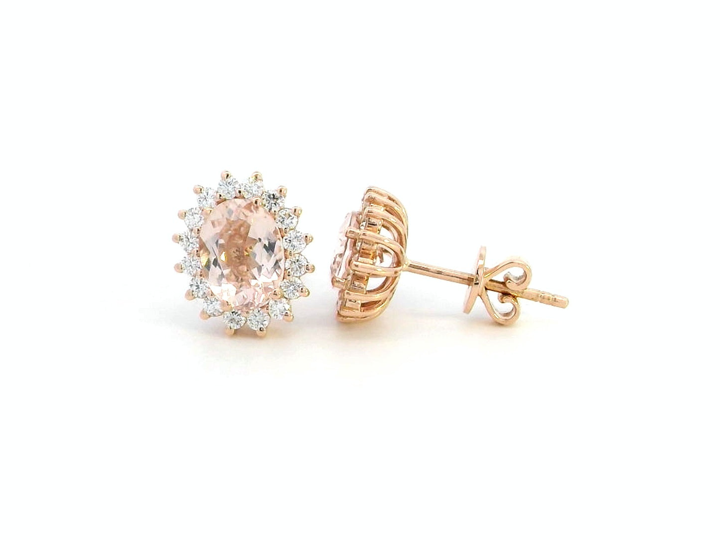 Diana-style 18K rose gold halo stud earrings featuring oval-cut morganites (2.77 carats) and round-cut diamonds (0.56 carats) in a regal, vintage-inspired design.