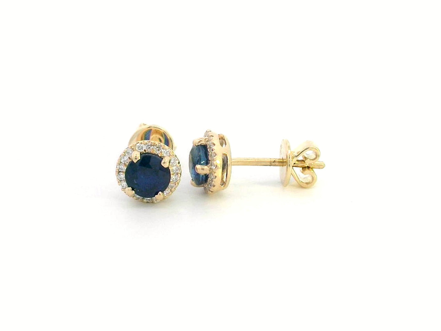 18K Gold Sapphire and Diamond Halo Stud Earrings featuring 1.48 carats of deep blue round-cut sapphires and 0.17 carats of brilliant diamonds,