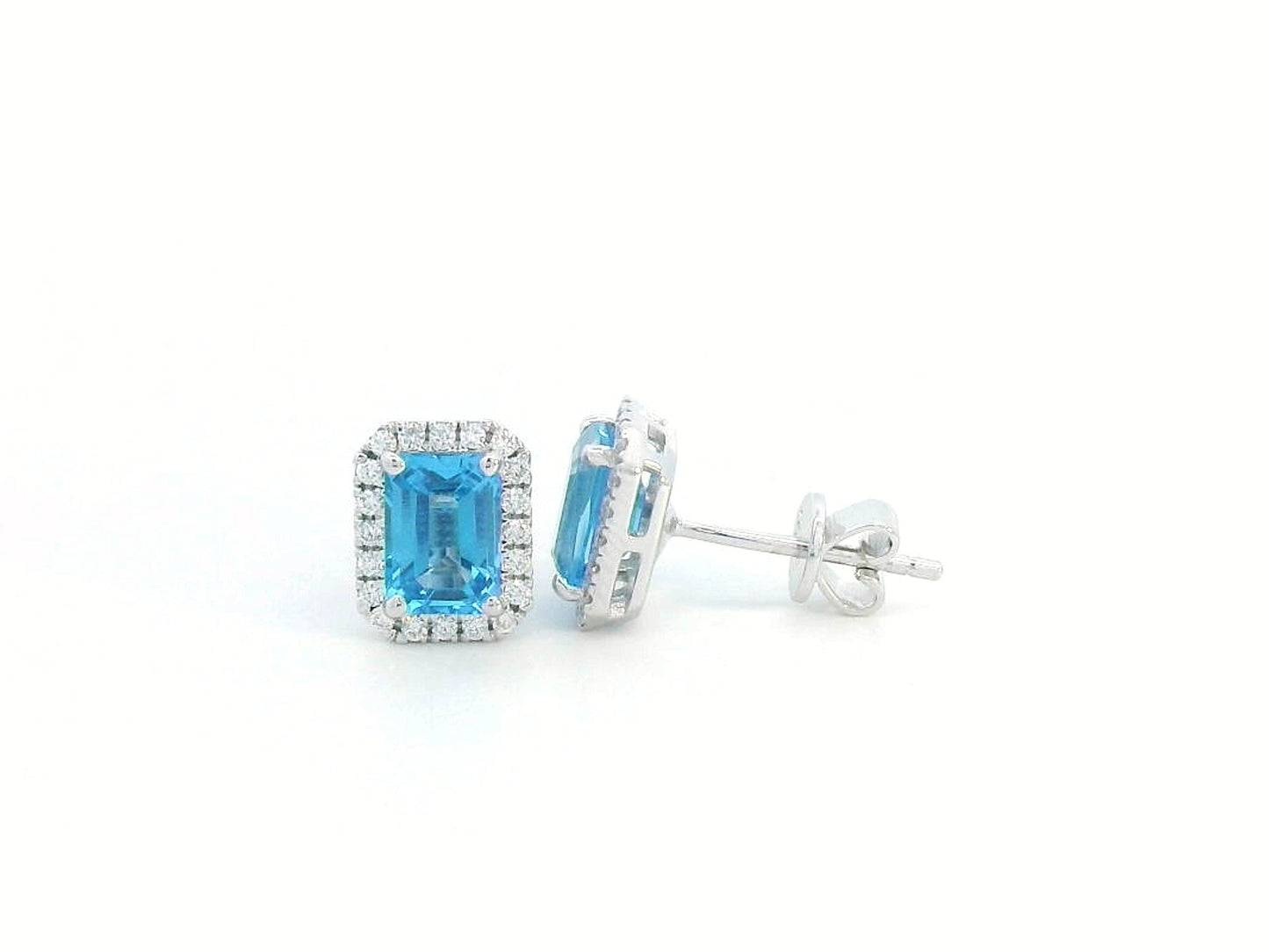 18K white gold blue topaz stud earrings with diamond halo, emerald-cut 2.18 CT gemstones, elegant gemstone earrings for women, December birthstone jewelry.