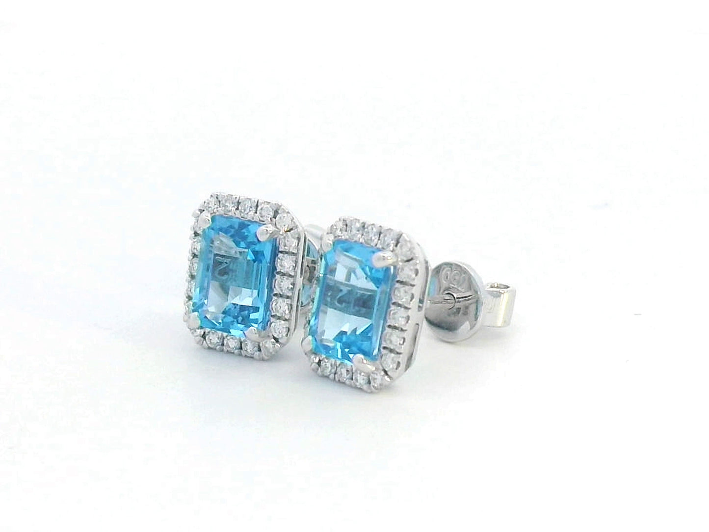 18K white gold blue topaz stud earrings with diamond halo, emerald-cut 2.18 CT gemstones, elegant gemstone earrings for women, December birthstone jewelry.