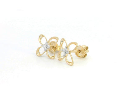 18K gold floral stud earrings with 0.05ct diamonds, featuring an open-petal design for a delicate, minimalist look.