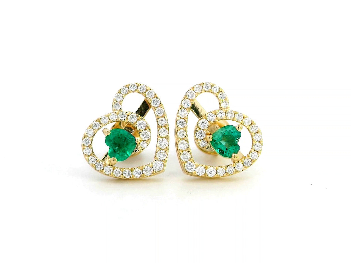 Heart shaped emerald and diamond earrings in 18K yellow gold with green emerald centres and intertwined diamond openwork design