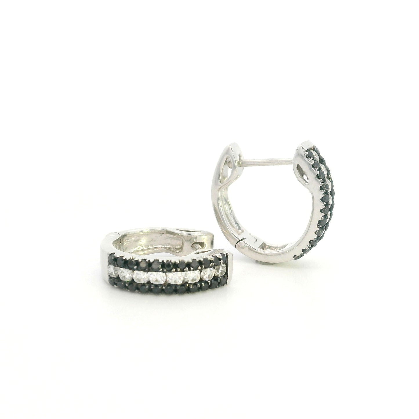 Black and white diamond hoop earrings in 18K white gold with three rows of round diamonds