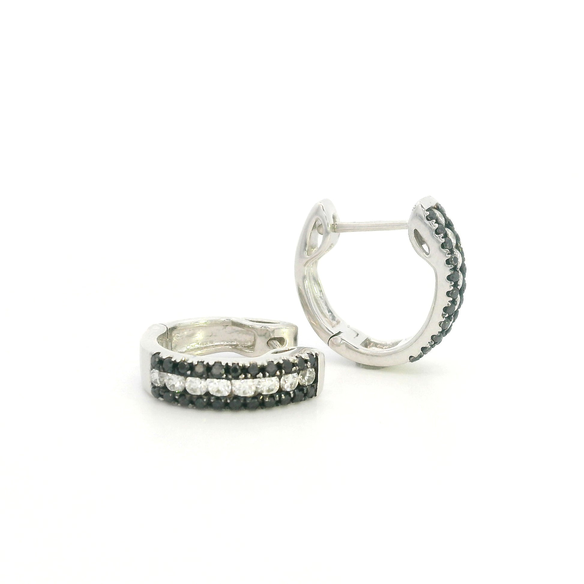 Black and white diamond hoop earrings in 18K white gold with three rows of round diamonds