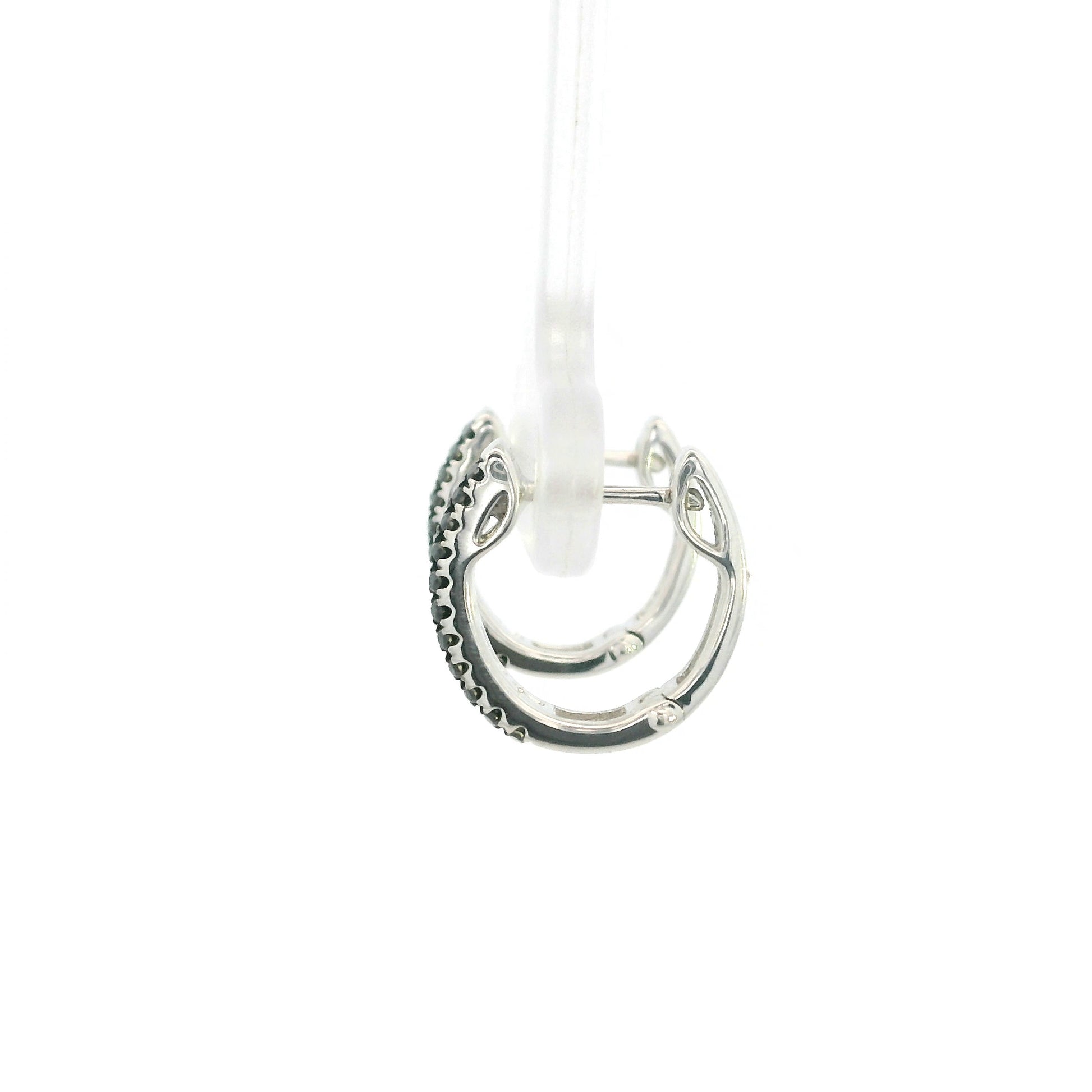 Black and white diamond hoop earrings in 18K white gold with three rows of round diamonds