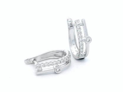 Two-row 18K white gold huggie earrings with pavé and bezel-set diamonds