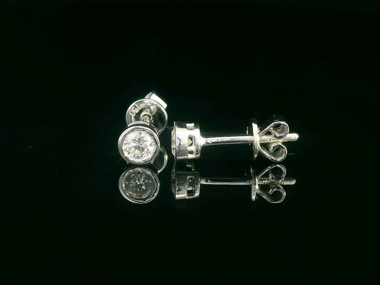 18K white gold bezel set diamond solitaire earrings with 0.32 carat round brilliant diamonds