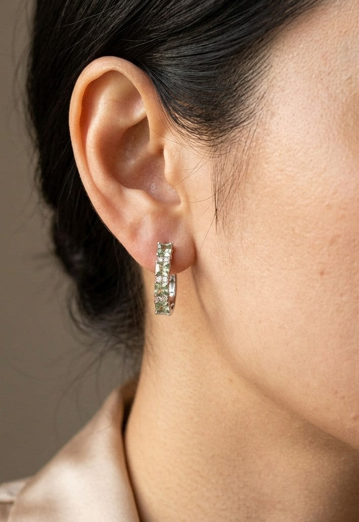 Green sapphire hoop earrings in 18K white gold with square-cut green sapphires and delicate diamond accents