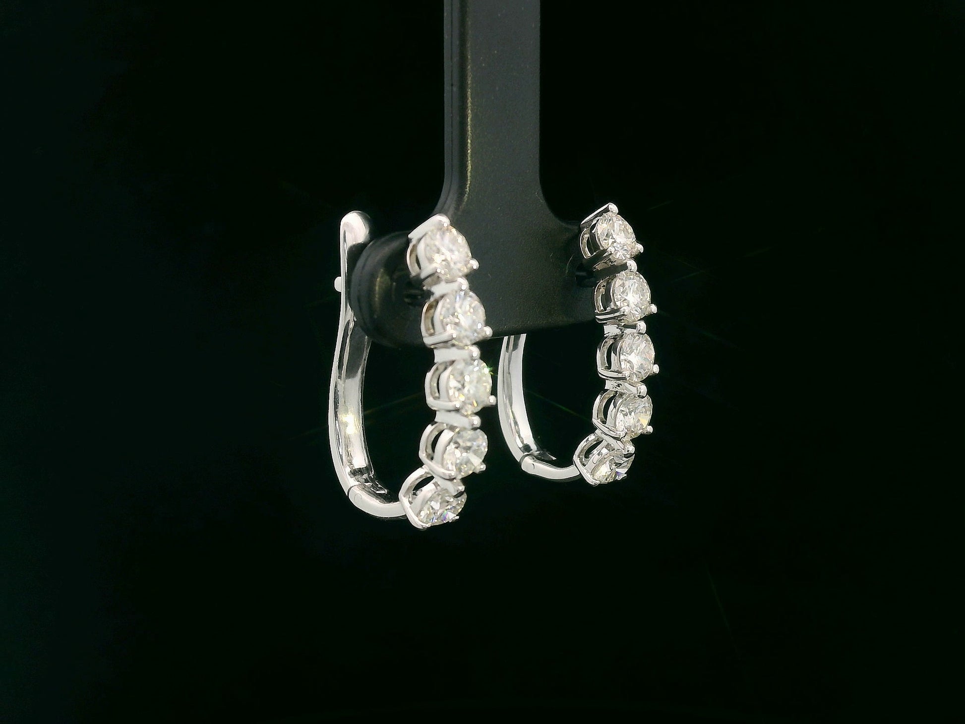 18K white gold hoop earrings with 1.90 carats of round brilliant diamonds arranged in a front-facing design

