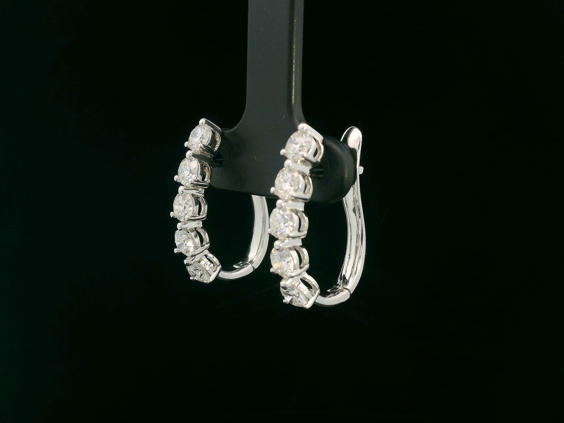 18K white gold hoop earrings with 1.90 carats of round brilliant diamonds arranged in a front-facing design

