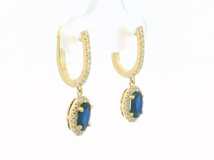 Elegant 18K gold drop earrings with 0.98ct oval blue sapphires and 0.26ct diamond halo and hoop design