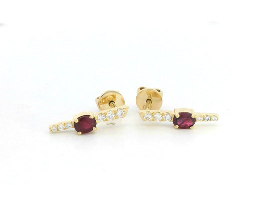 18K gold vertical earrings with 0.51ct oval rubies and 0.16ct round diamonds in a linear design with screw-back posts