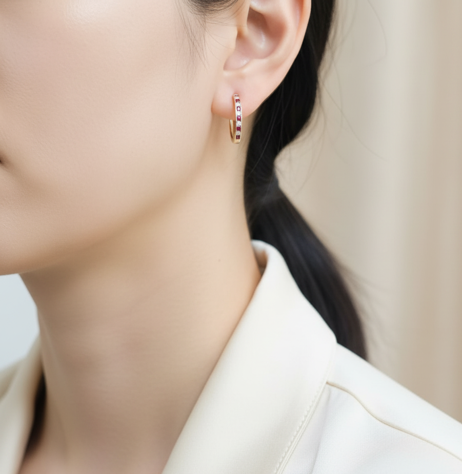 18K yellow gold ruby and diamond hoop earrings — channel-set rubies (0.36ct) and diamonds (0.27ct) by Emirates Diamonds