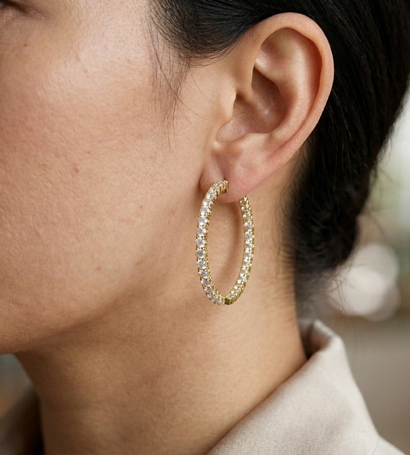 Natural diamond hoop earrings in 18K yellow gold with round brilliant diamonds
