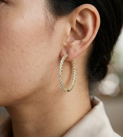 Natural diamond hoop earrings in 18K yellow gold with round brilliant diamonds
