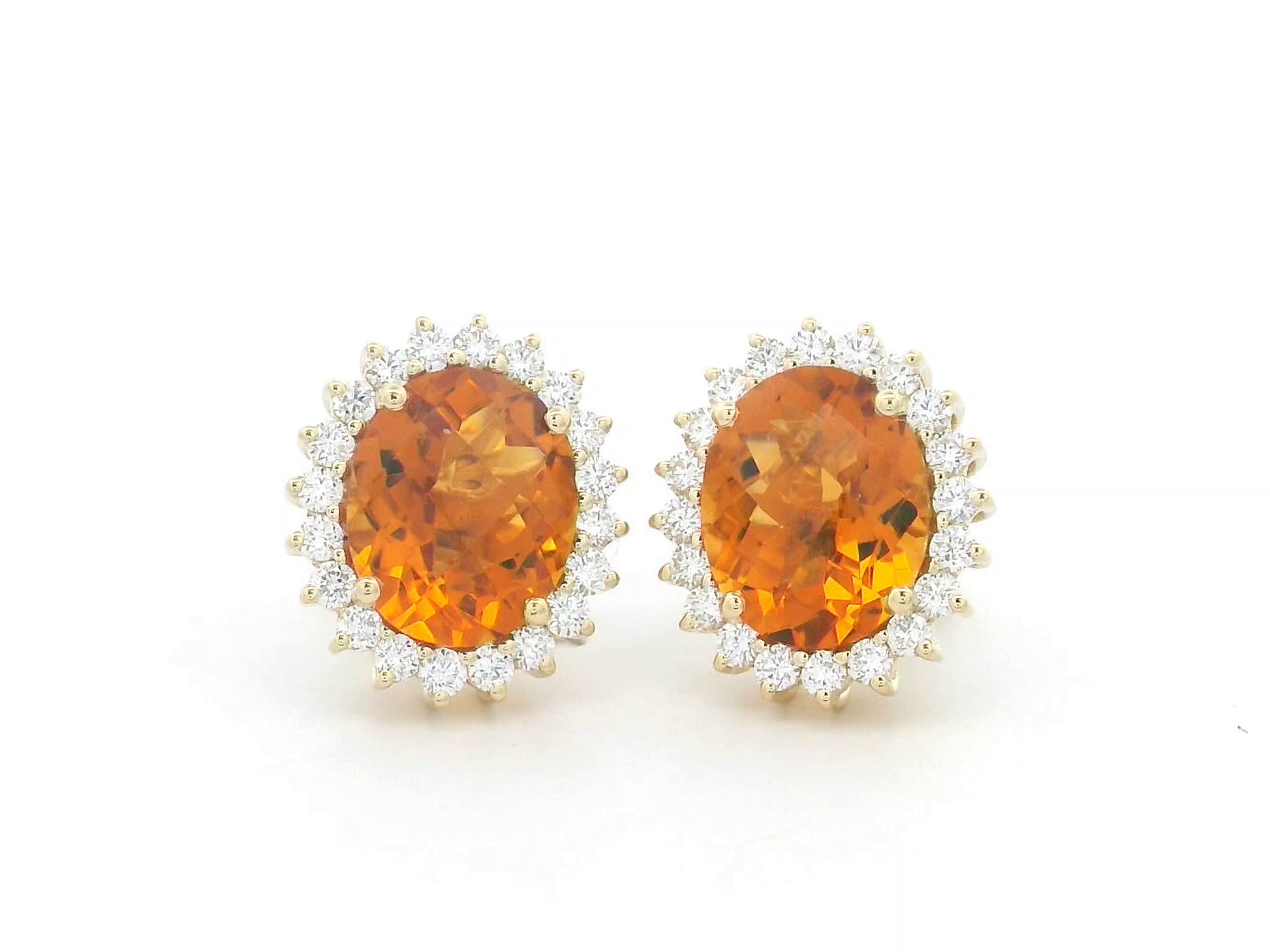Oval amber-hued citrine stud earrings in 18K yellow gold with diamond sunburst halo – 5.35 carats total