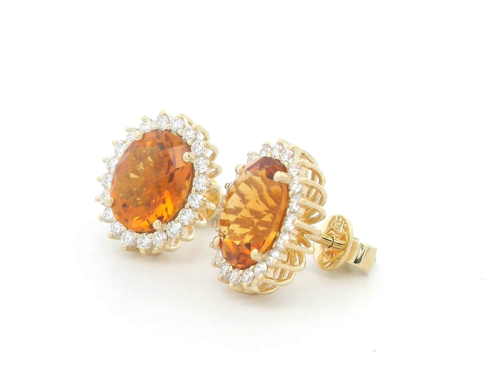 Oval amber-hued citrine stud earrings in 18K yellow gold with diamond sunburst halo – 5.35 carats total