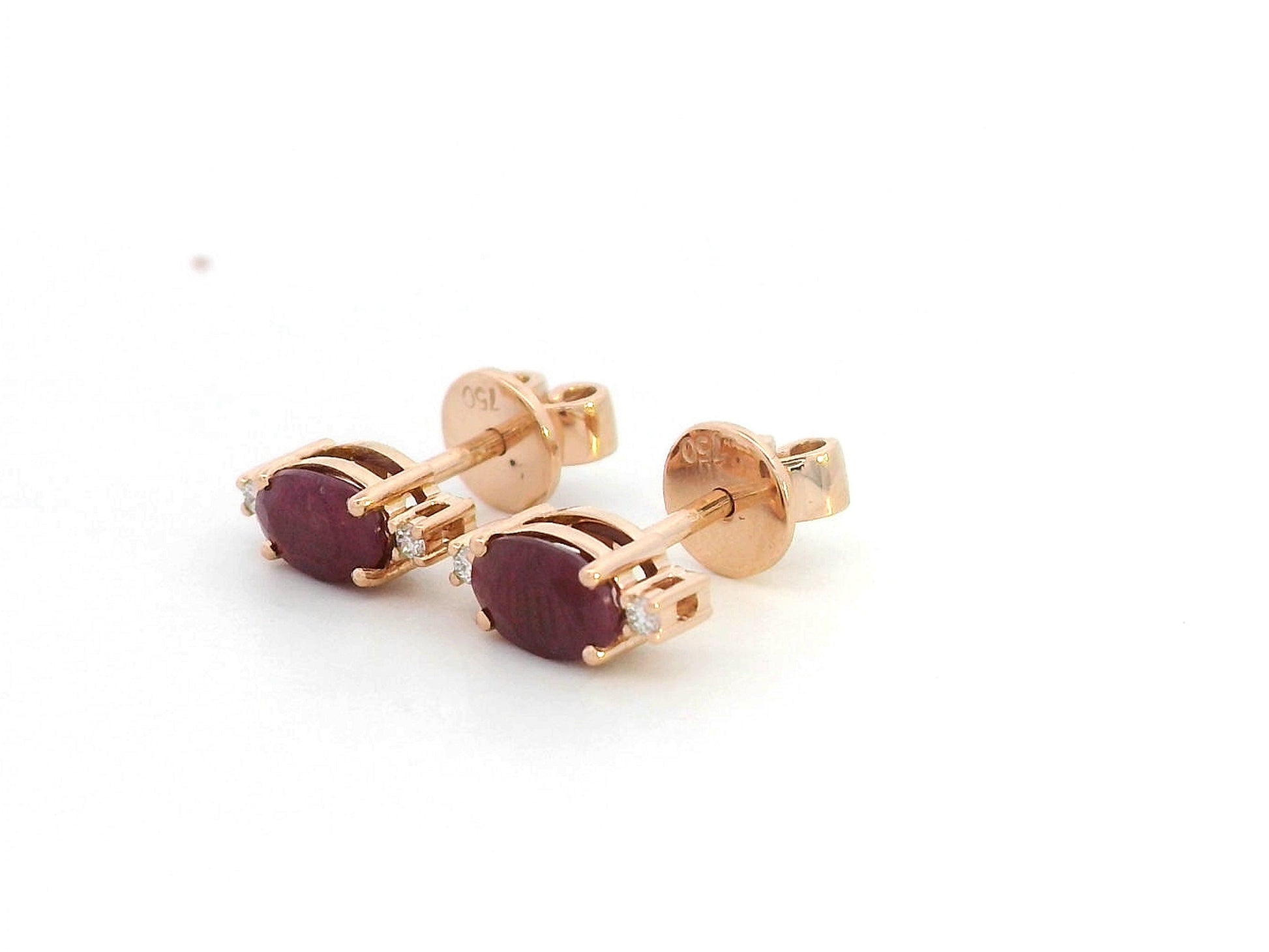 Side-set diamond accented ruby earrings in 18K rose gold