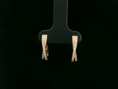 Pair of diamond earrings on a black earring stand