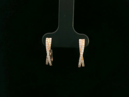 Pair of diamond earrings on a black earring stand