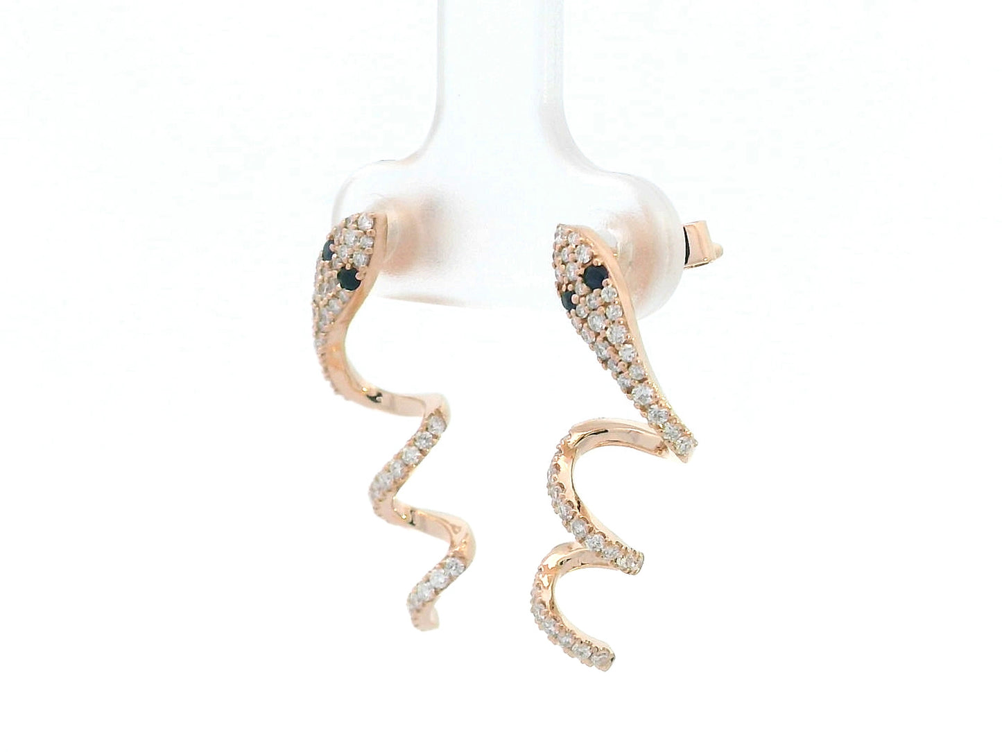 Artistic snake earrings in rose gold featuring shimmering diamonds