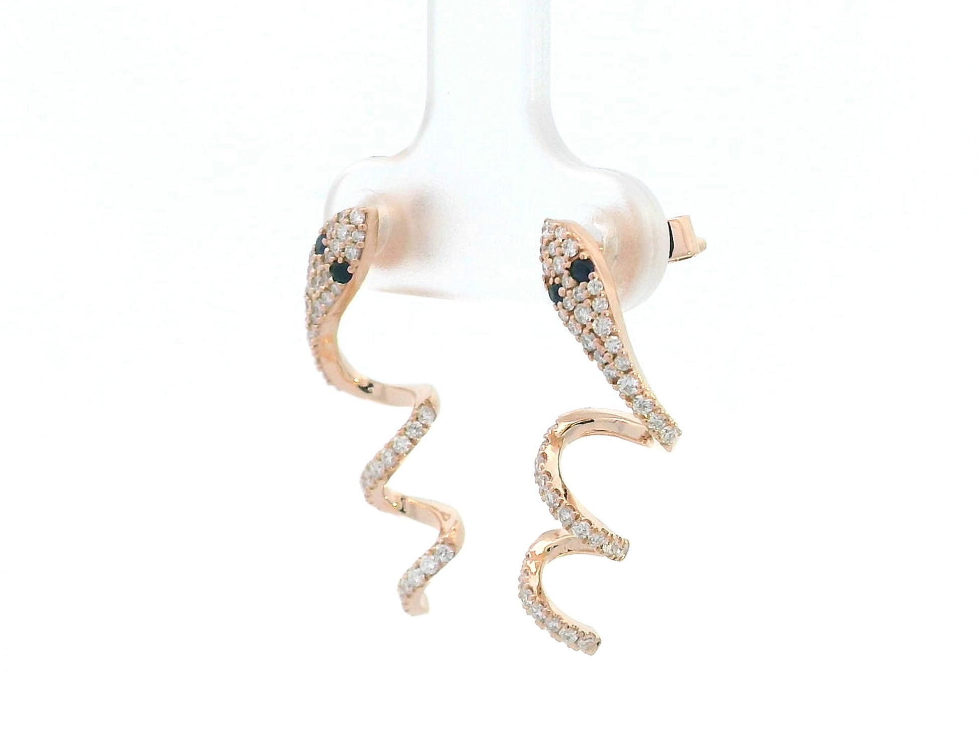 Artistic snake earrings in rose gold featuring shimmering diamonds