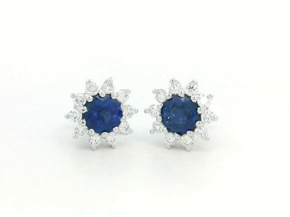 Sunburst-style diamond halo earrings with sapphires