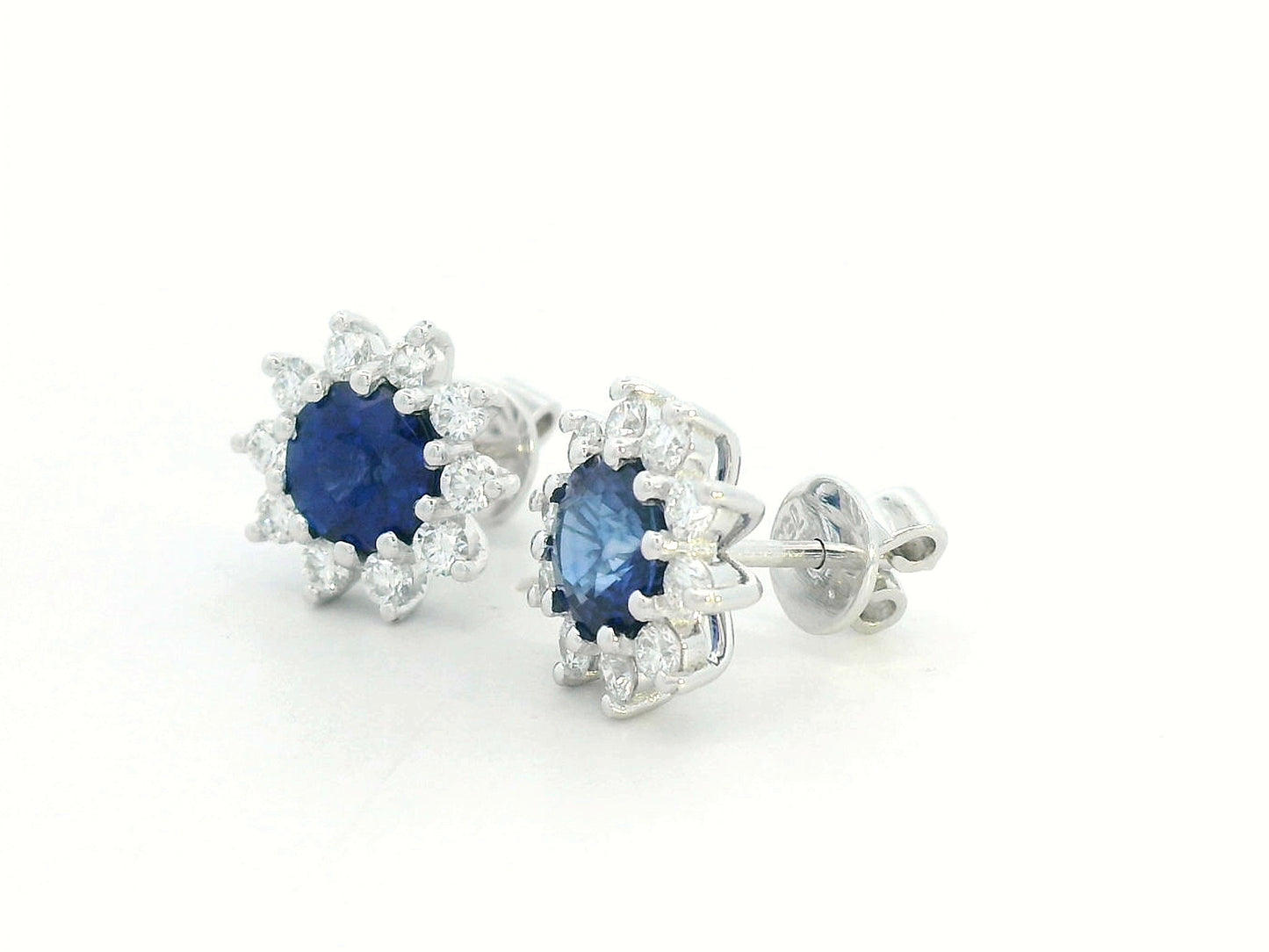 Elegant sapphire and diamond stud earrings in 18K white gold