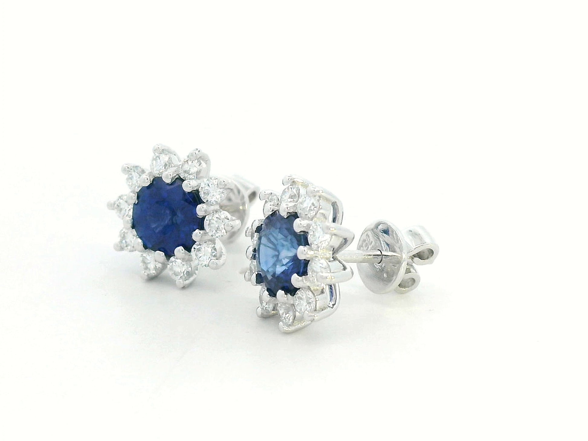 Elegant sapphire and diamond stud earrings in 18K white gold