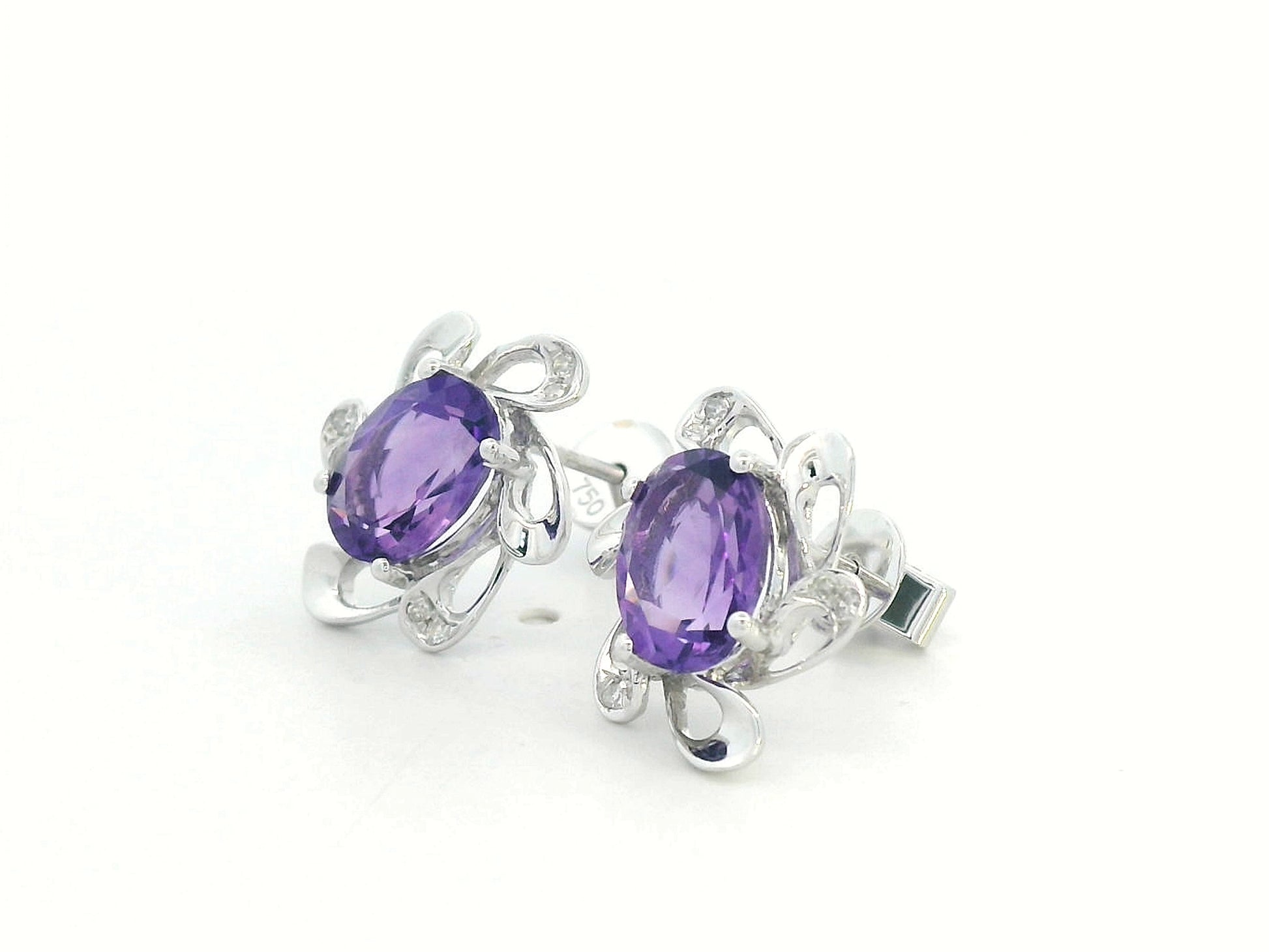 8K white gold amethyst stud earrings with oval purple gemstones and diamond halo in floral setting, elegant fine jewelry