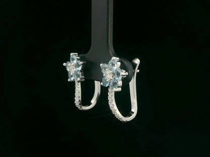 Aquamarine and diamond flower earrings in white gold
